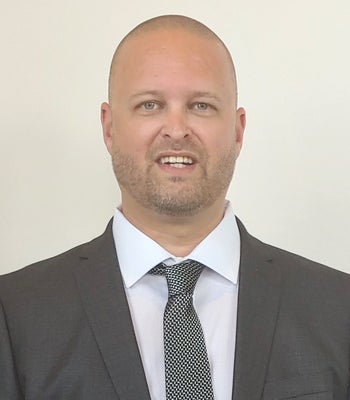 Portrait of Howard Neal, REALTOR®.